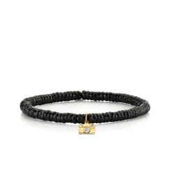 Gold & Diamond Camera On Black Spinel