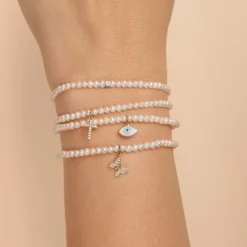 Gold & Diamond Cross on Pearls