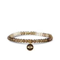 Gold & Diamond Eye Coin on Shaded Quartz