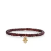 Gold & Diamond Hamsa on Garnet