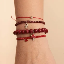 Gold & Diamond Hamsa on Garnet
