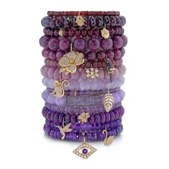 Gold & Diamond Hamsa on Garnet