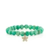 Gold & Diamond Plumeria on Amazonite