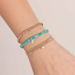 Gold & Diamond Tequila Shot on Turquoise