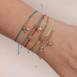 Gold & Diamond Tiny Aquarius Zodiac Cord Bracelet