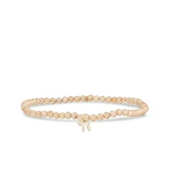 Gold & Enamel Tiny Chai on Beige Zircon