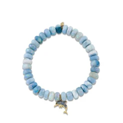 Gold & Sapphire Dolphin on AB African Opal