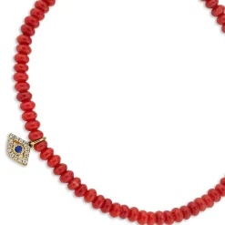 Gold Bezel Sapphire & Diamond Eye on Red Sea Bamboo