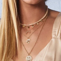 Pure Gold Multi Charm on Ethiopian Welo Opal Necklace