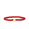 Pure Gold Tiny Heart on Red Sea Bamboo