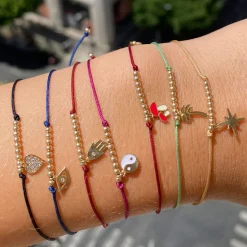 Pure Gold Tiny Palm Tree Cord Bracelet